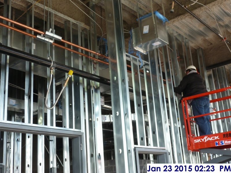 Installing copper piping at the 3rd floor Facing North